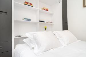 WHome | Marquês Premium Apartmentにあるベッド