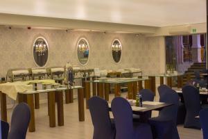 Reštaurácia alebo iné gastronomické zariadenie v ubytovaní Jasek Premium Hotel Wrocław