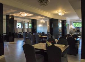 Reštaurácia alebo iné gastronomické zariadenie v ubytovaní Jasek Premium Hotel Wrocław