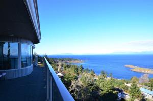 a view of the ocean from the balcony of a house at Gibralter Rock Ocean View B&B in Nanaimo