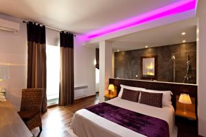 Postel nebo postele na pokoji v ubytování Château De Siran - Hôtel & Spa