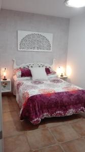 Postel nebo postele na pokoji v ubytování La Casa De Las Abuelas