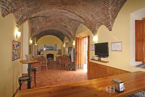 Televízia a/alebo spoločenská miestnosť v ubytovaní Casa Rural "Casa Isla del Zújar"