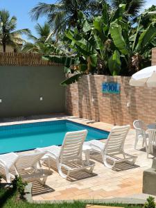 Pousada Reserva do Tombo Lounge Hostel tesisinde veya buraya yakın yüzme havuzu