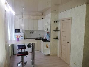 Chern63 in Borisovにあるキッチンまたは簡易キッチン