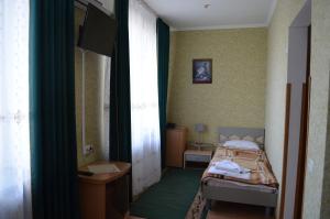 Krevet ili kreveti u jedinici u okviru objekta Gostiniy Dvor
