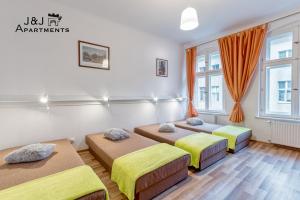 J&J Apartments Łazienna 30 - 10客房内的一张或多张床位