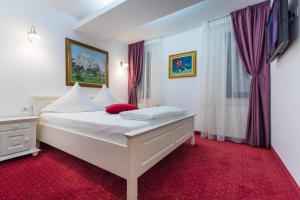 Katil atau katil-katil dalam bilik di Hotel Casa David