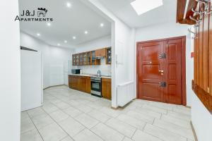 J&J Apartments Łazienna 30 - 10的厨房或小厨房
