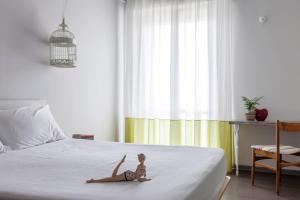Postel nebo postele na pokoji v ubytování Hotel Madison