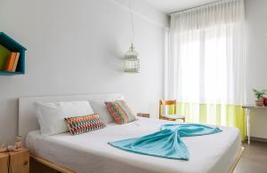Postel nebo postele na pokoji v ubytování Hotel Madison