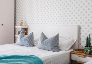 Postel nebo postele na pokoji v ubytování Hotel Madison