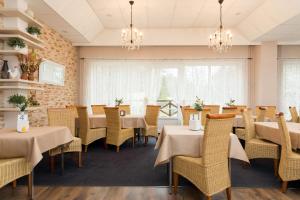 Reštaurácia alebo iné gastronomické zariadenie v ubytovaní Gryf Resort Międzywodzie