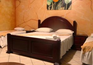 Ein Bett oder Betten in einem Zimmer der Unterkunft Apart Hotel K-Lisma