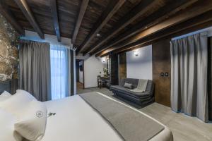 Postel nebo postele na pokoji v ubytování Matian Hotel Boutique + 30 fotografií