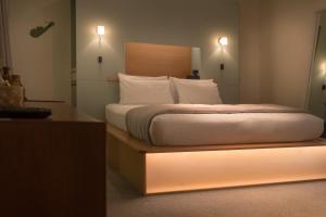 Cama ou camas em um quarto em Ohtel Wellington