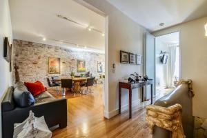 a living room with a couch and a table at Loft in Lower Nob Hill in San Francisco +22 photos