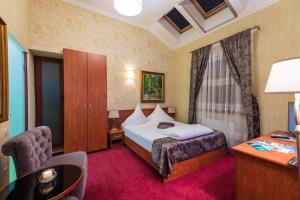 Hotel Casa David tesisinde bir odada yatak veya yataklar