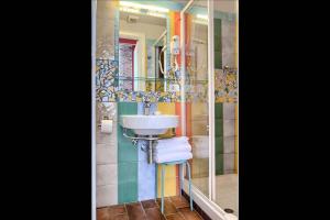 A bathroom at Alloggio per uso turistico D'Ambrosio Antonella Gli Scipioni 53