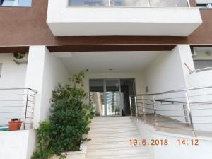 a stairway leading to the entrance of a house at Apartments Svilen Konac in Budva