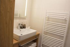 Kúpeľňa v ubytovaní Berg' & Bluamen Appartements Stubai