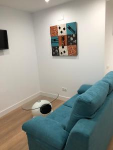 A seating area at Apartamentos Catedral Escalinata