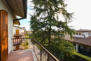 Een balkon of terras bij My Garda Holiday Home Peschiera 1
