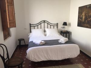 Posteľ alebo postele v izbe v ubytovaní Inés Casa Rural