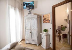TV a/nebo společenská místnost v ubytování Bed and Breakfast Conte Luna