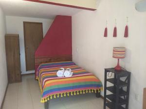 Un ou plusieurs lits dans un hébergement de l'établissement La Abuelita Hostal