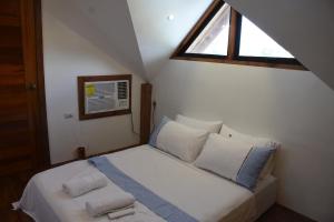 En eller flere senge i et værelse på Descanso En Paraiso Resort + 143 billeder