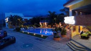 Bazén v ubytování Hotel San Carlos Yautepec nebo v jeho okolí