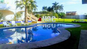 Bazén v ubytování Hotel San Carlos Yautepec nebo v jeho okolí