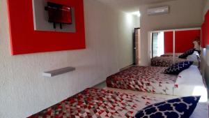 Postel nebo postele na pokoji v ubytování Hotel San Carlos Yautepec