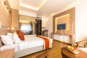 Letto o letti in una camera di Landmark Kathmandu