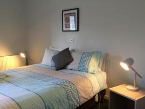 Kilcunda Ocean View Motel客房内的一张或多张床位