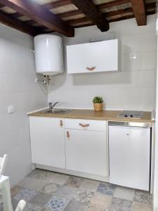 Kuchnia lub aneks kuchenny w obiekcie CH Apartments