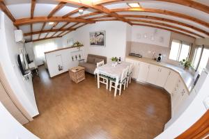 an overhead view of a living room and kitchen with a table at Suites & Spa Galilee in Qiryat Shemona