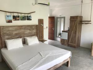 Rúm í herbergi á Jippie The Villa +37 myndir