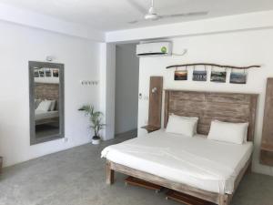 Voodi või voodid majutusasutuse Jippie The Villa toas