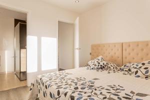 Cama o camas de una habitación en Apartamento Urbatenis