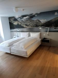 Rúm í herbergi á Hotel & Restaurant Forni