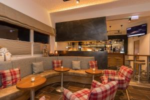 TV a/nebo společenská místnost v ubytování Hotel Almrausch
