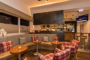 
Lounge oder Bar in der Unterkunft Hotel Almrausch
