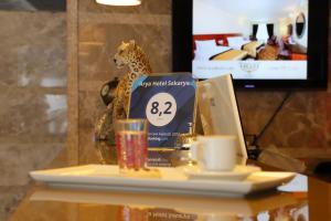 TV a/nebo společenská místnost v ubytování Arya Hotel Sakarya