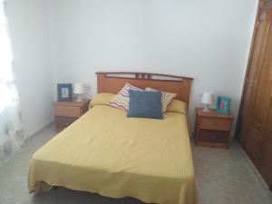 Posteľ alebo postele v izbe v ubytovaní Casa La Charca De Famara