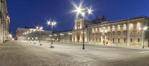 a large building with street lights in front of it at Senigallia d'aMare in Senigallia