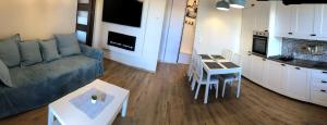 Kuchnia lub aneks kuchenny w obiekcie Lux Garden Apartment