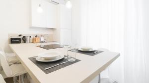 A kitchen or kitchenette at Italianway - Vincenzo Monti 36