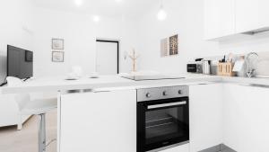 A kitchen or kitchenette at Italianway - Vincenzo Monti 36